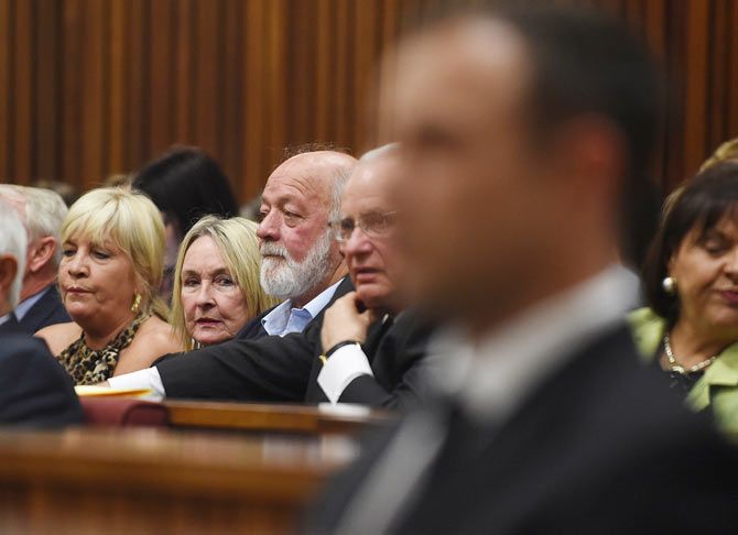 Reeva Steenkamp's parents June and Barry Steenkamp sit in the Pretoria High Court
