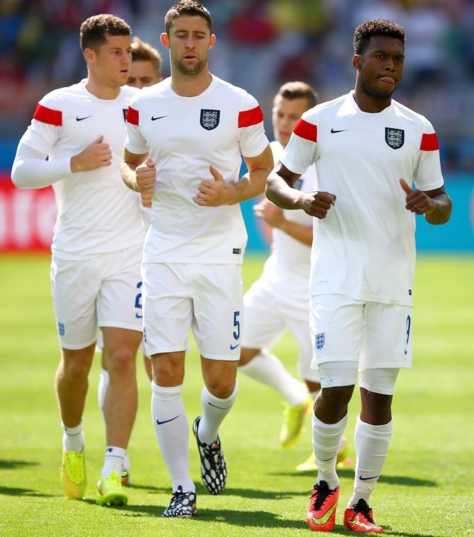 From left, Ross Barkley, Gary Cahill and Daniel Sturridge of England warm up