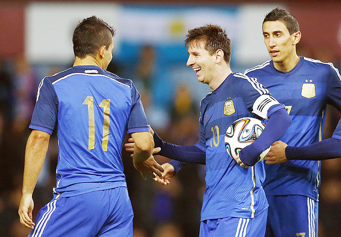 Argentina's Lionel Messi (centre) celebrates 