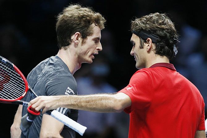Roger Federer (right) embraces Andy Murray after their match on Thursday