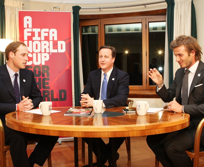 England 2018 Bid Ambassador David Beckham, right, Prince William, left, and British Prime   Minister David Cameron meet in Hotel