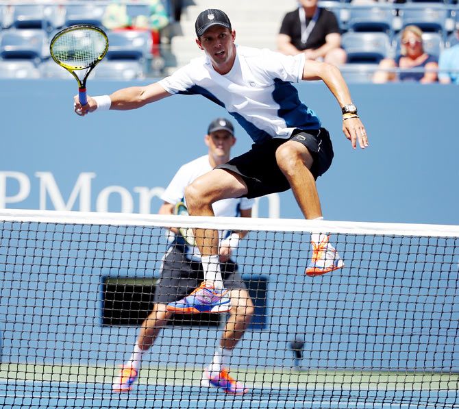 Bob and Mike Bryan in action