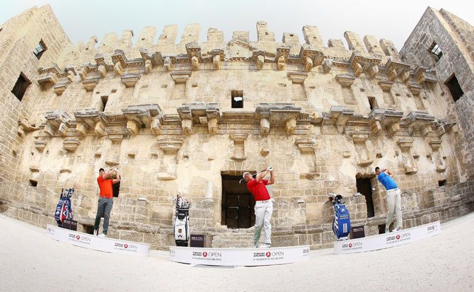 Sergio Garcia of Spain, Henrik Stenson of Sweden and Lee Westwood of England take on the challenge to hit golf balls over the towering walls of the 2,000 year-old Amphitheater of Aspendos