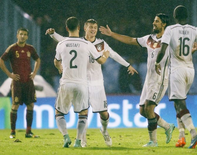 Germany's Toni Kroos, centre, celebrates his goal against Spain