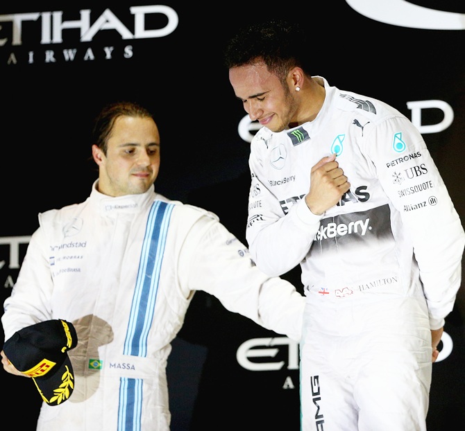  Lewis Hamilton of Great Britain and Mercedes GP celebrates on the podium next to Felipe   Massa of Brazil