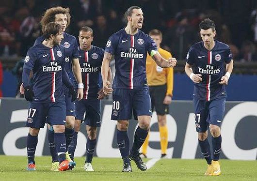 Paris St Germain's Zlatan Ibrahimovic (2nd from right) reacts after he scored against Ajax Amsterdam during their Champions League Group F soccer match at the Parc des Princes Stadium in Paris on Tuesday