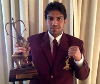 Manoj Kumar proudly displays the Arjuna award