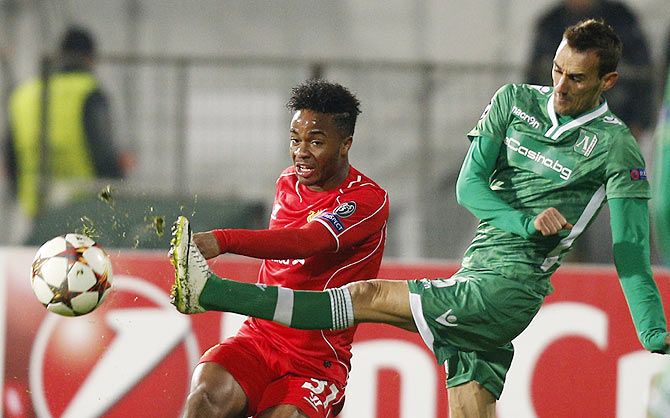 Yordan Minev (right) of Ludogorets challanges Raheem Sterling of Liverpool during their Champions League Group B match at Vassil Levski stadium in Sofia, on Wednesday