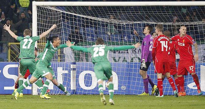 Players of Ludogorets celebrate their second goal against Liverpool on Wednesday