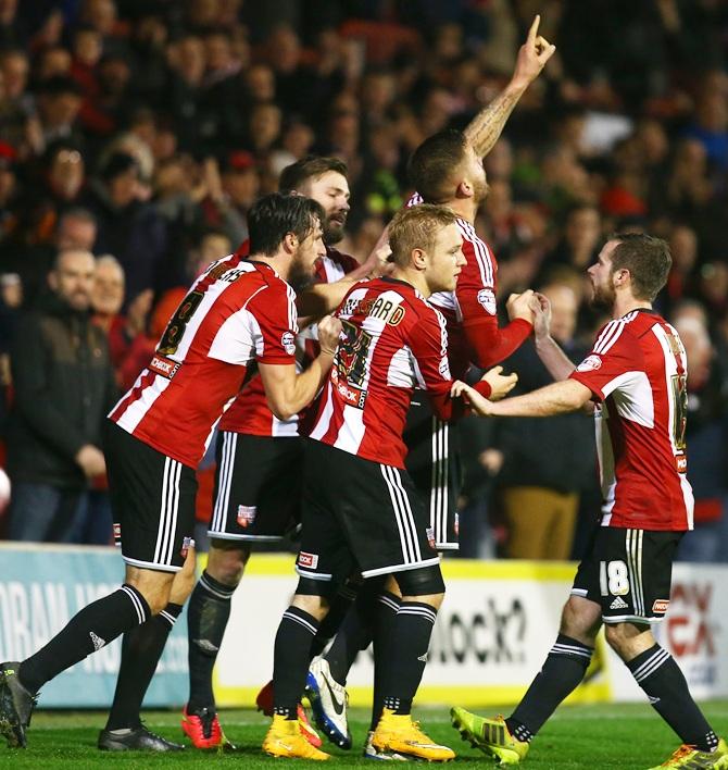 Harlee Dean of Brentford celebrates