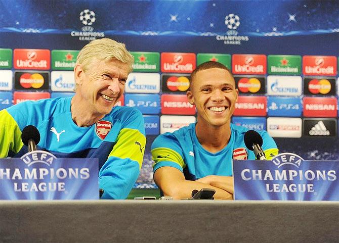 Arsenal manager Arsene Wenger with defender Kieran Gibbs