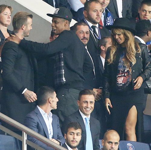 Recording artists Beyonce her husband Jay-Z greet David Beckham 