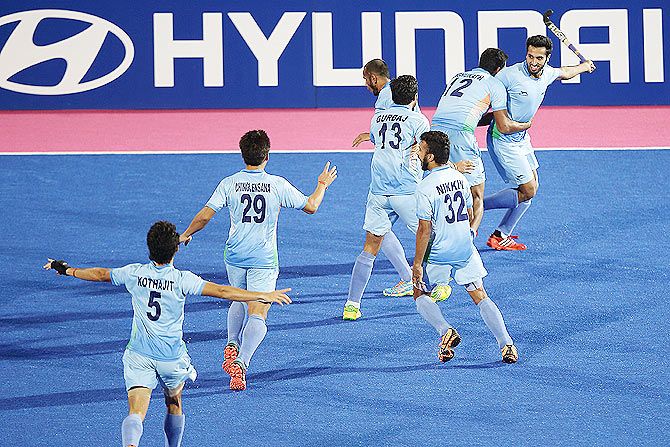 India players celebrate after the scoring the winning goal to win the hockey gold medal on Thursday.