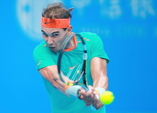 Rafael Nadal of Spain returns a shot against Peter Gojowczyk of Germany during day six of the China Open