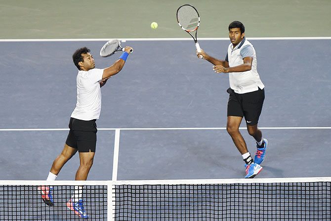 Rohan Bopanna and Leander Paes of India in action during the Rakuten Open 2014 at Ariake Colosseum in Tokyo
