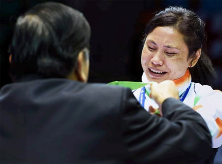 India's Sarita Devi refuses to accept the bronze medal