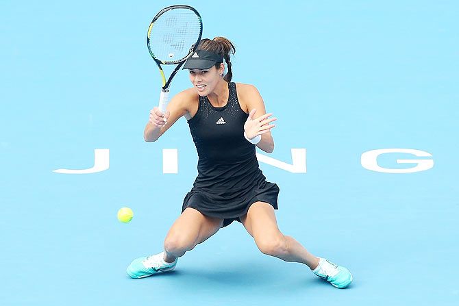 Ana Ivanovic of Serbia plays a forehand in her match against Sabine Lisicki of Germany at the China Open on Thursday