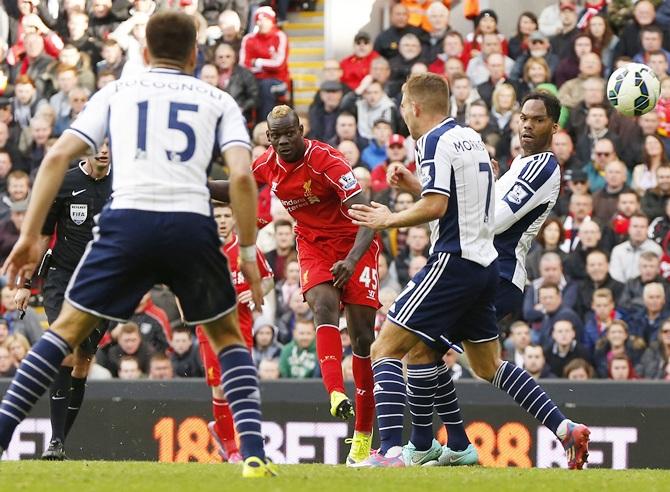 Liverpool's Mario Balotelli shoots