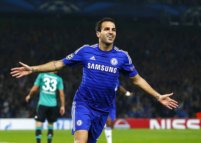 Chelsea's Cesc Fabregas celebrates after scoring a goal against Schalke 04 during their Champions League soccer match