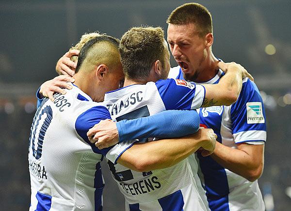 Roy Beerens of Berlin celebrates scoring his goal with Anis Ben - Hatira and Sandro Wagner during the Bundesliga match between Hertha BSC and Vfb Stuttgart 