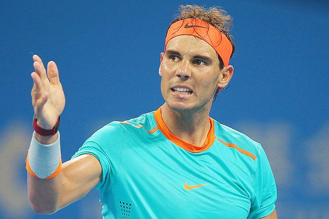 Rafael Nadal of Spain reacts after losing a point in his match against Martin Klizan of Slovakia