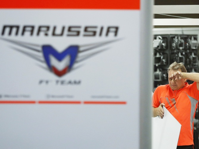 A pit crew of Marussia