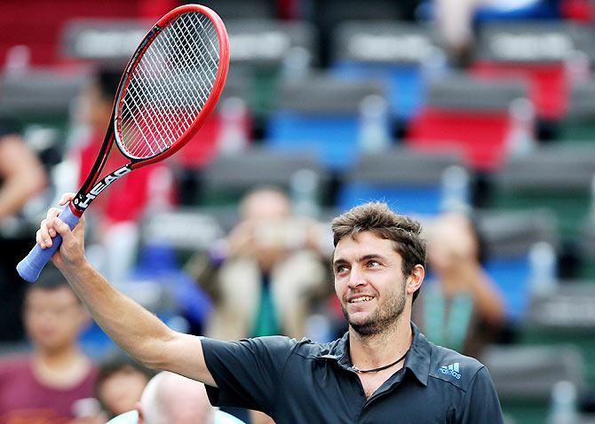 Gilles Simon of France reacts after winning his match against Tomas Berdych of the Czech Republic in Shanghai on Friday