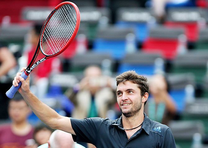 Gilles Simon of France reacts after winning his match against Tomas Berdych of the Czech Republic in Shanghai on Friday