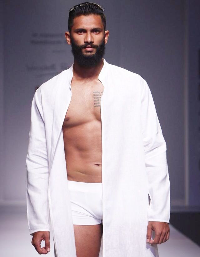 Prathamesh Maulingkar poses during the Wills Lifestyle India Fashion Week (WIFW) in New Delhi in 2014