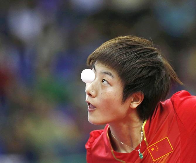 China's Ding Ning serves 