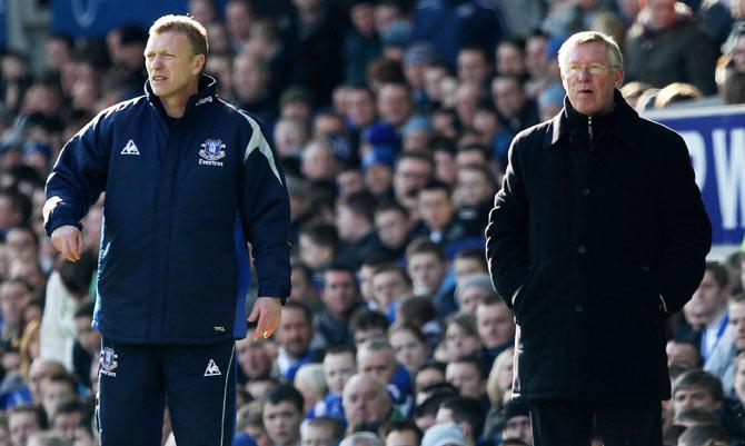 Everton manager David Moyes with Manchester United manager Sir Alex Ferguson during the Barclays Premier League match 