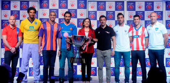 ISL players during the unvieling of the trophy in Mumbai in 2014