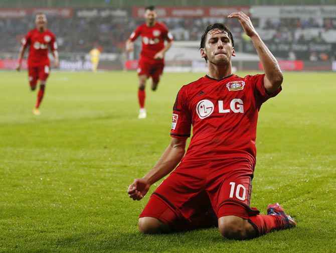 Bayer Leverkusen's Hakan Calhanoglu celebrates