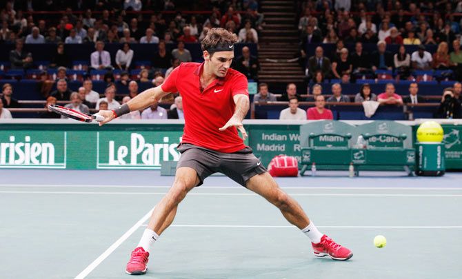Roger Federer of Switzerland in action against Jeremy Chardy of France at the at Palais Omnisports de Bercy on Wednesday