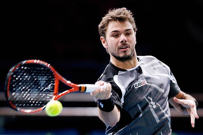 Stanislas Wawrinka of Switzerland in action against Dominic Thiem of Austria 