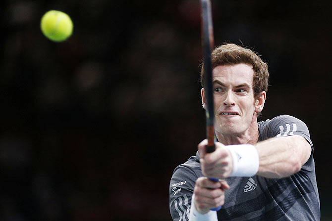 Andy Murray of Britain returns a shot during his men's singles tennis match against Grigor Dimitrov of Bulgaria 