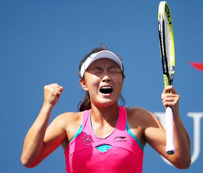 Shuai Peng of China celebrates