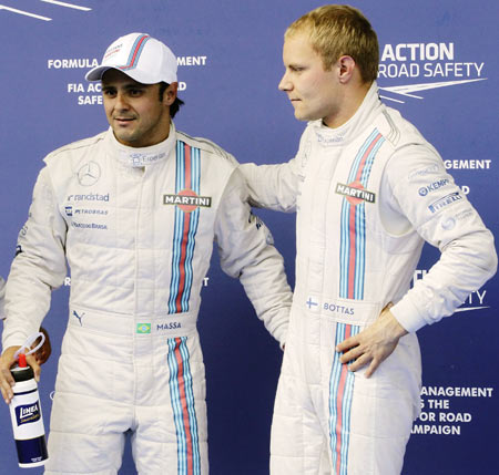 Felipe Massa of Brazil and Valtteri Bottas of Finland