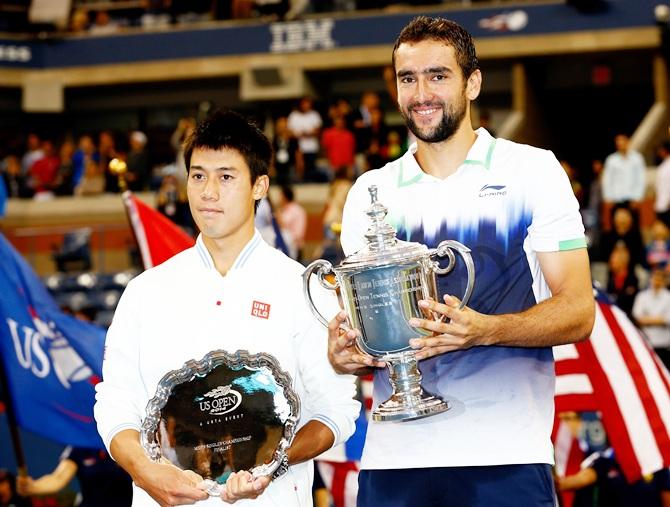 Kei Nishikori, left, of Japan and Marin Cilic of Croatia