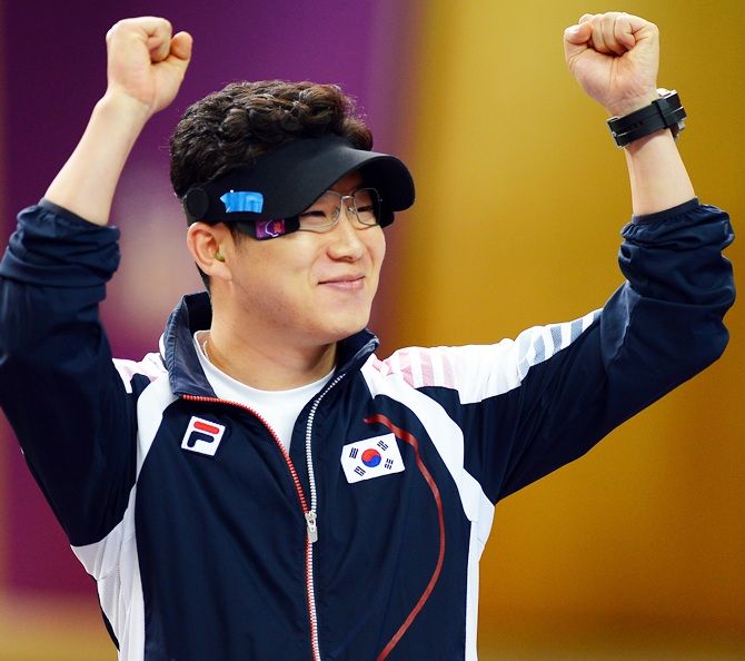 Jongoh Jin of Korea reacts after winning the gold medal. 