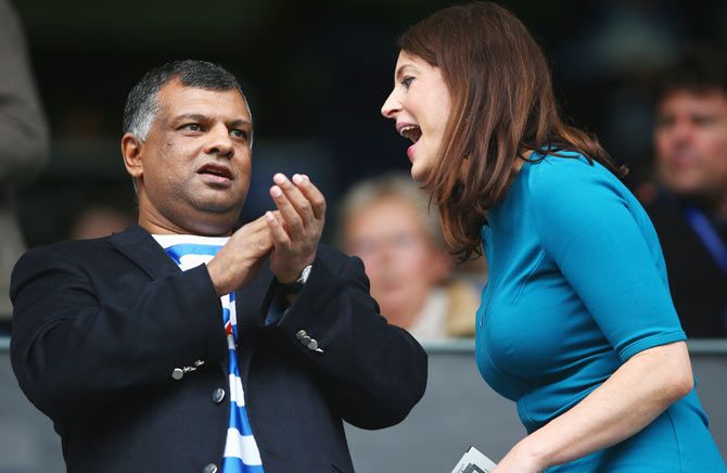 QPR Chairman Tony Fernandes and a friend during the Barclays Premier League match between Queens Park Rangers and Sunderland at Loftus Road on August 30, 2014