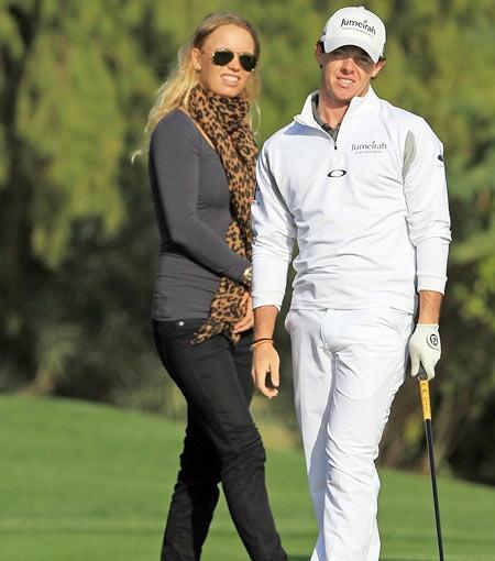 Rory McIlroy of Northern Ireland with Caroline Wozniacki