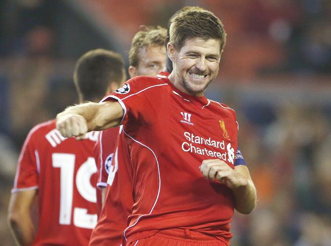 Liverpool's Steven Gerrard celebrates after scoring a penalty against Ludogorets during their Champions League soccer match at Anfield 