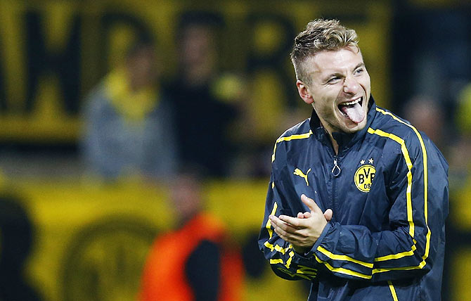 Borussia Dortmund's Ciro Immobile celebrates after defeating Arsenal in their Champions League group D soccer match on Tuesday