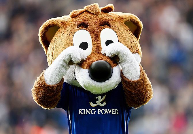 Filbert the Leicester City mascot 'cries' infront of the Manchester United fans following his team's 5-3 victory during the Barclays Premier League match on Sunday