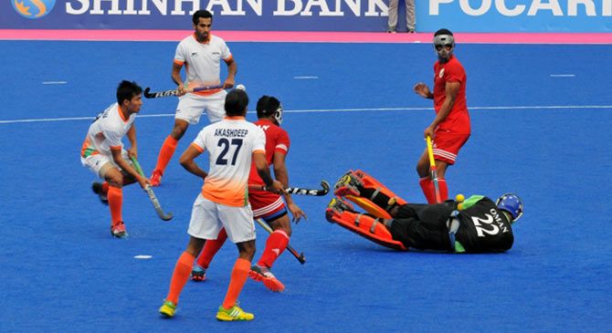 Action in the Asian Games match between India and Oman