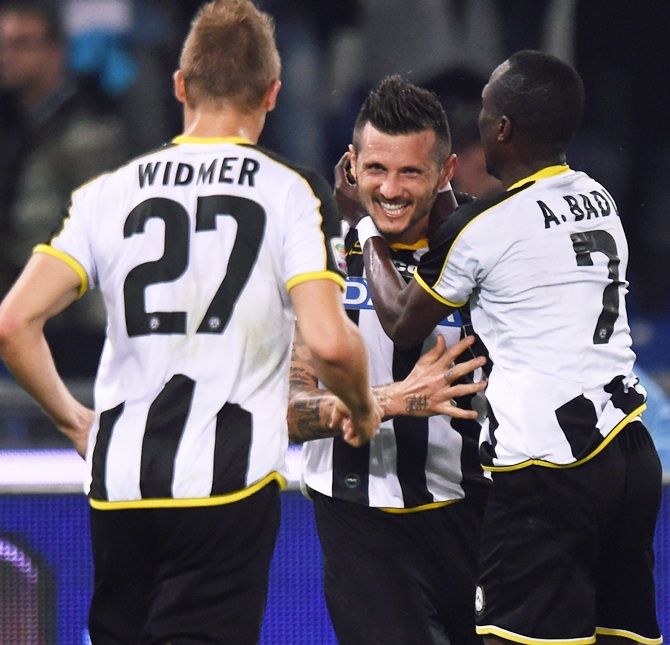 Cyril Thereau, centre, of Udinese celebrates