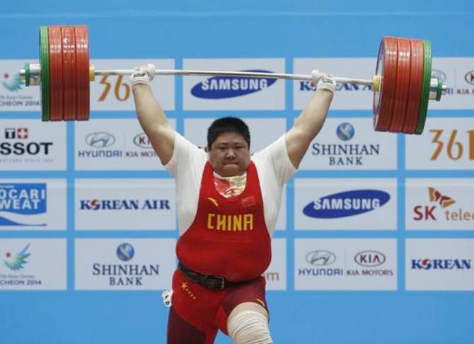 China's Zhou sets clean and jerk world record, wins gold - Rediff Sports