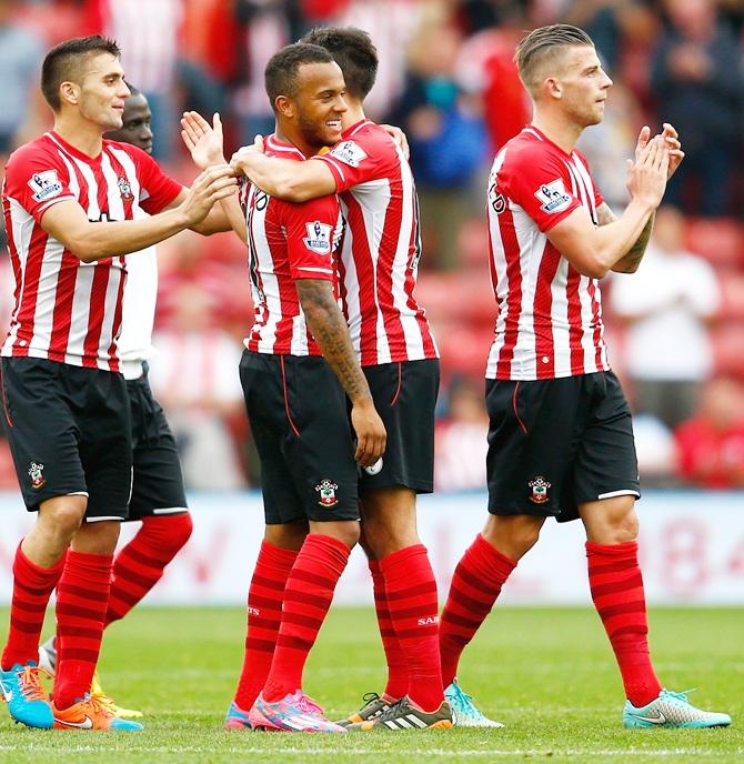 Ryan Bertrand, centre, of Southampton celebrates