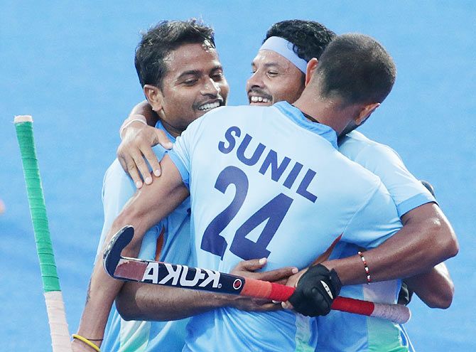 Birendra Lakra of India celebrates after scores a goal during the Hockey Men's Pool B match between India and China on Saturday